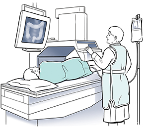 Healthcare provider giving barium enema to patient on exam table and taking x-ray image. 