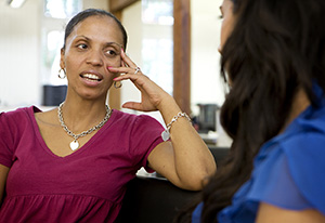 Woman talking with therapist.