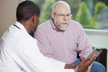 Man talking with a doctor