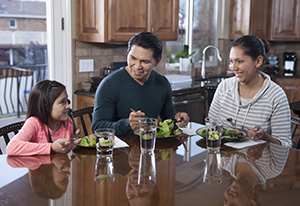 Family eating a healthy meal together