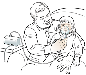 Man holding toddler girl on lap helping her breathe through nebulizer mask.