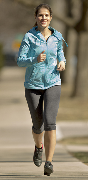 Woman jogging outdoors.
