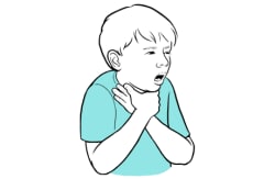 Niño que se agarra la garganta con ambas manos mientras se ahoga.