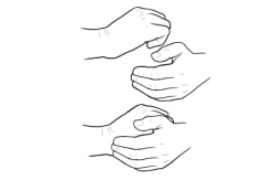 Dos pares de manos: uno con la mano delante del puño, mostrando el costado del puño con el dedo meñique, y otro con la mano agarrando el puño.