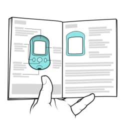 Hand holding open instruction booklet for glucometer.