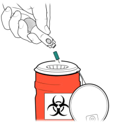 Lancet being ejected from lancet holder into sharps container.
